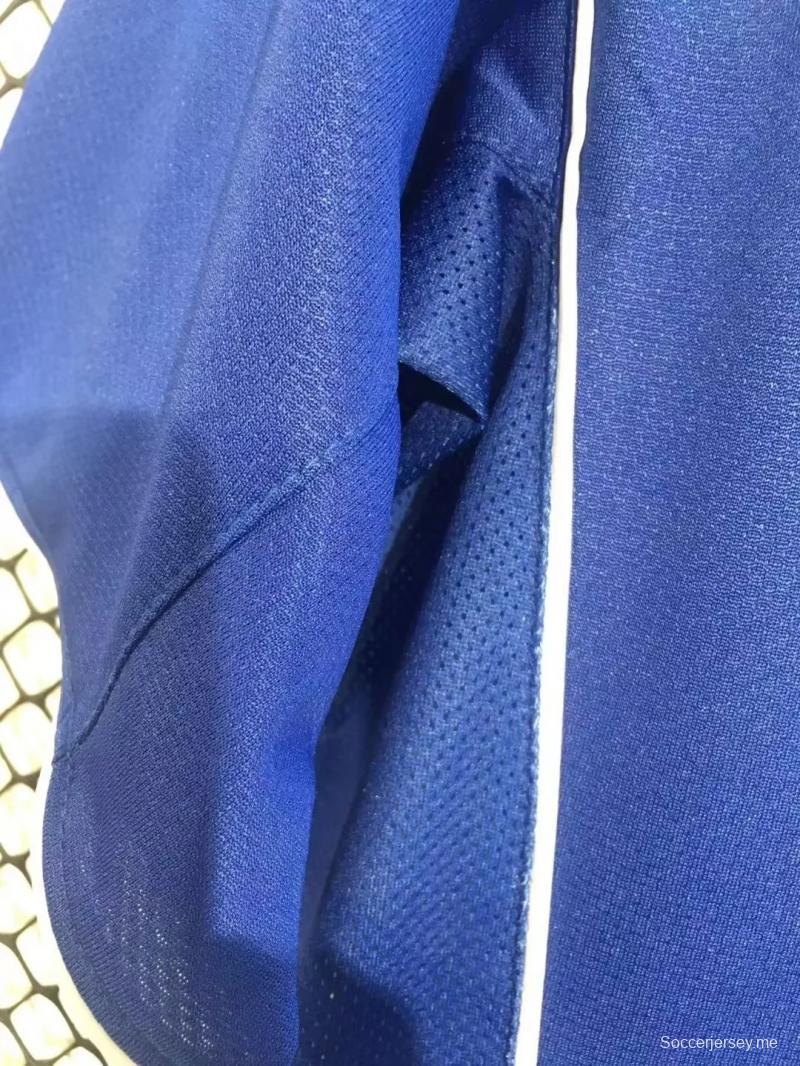 قميص أزرق عتيق من البرازيل 2004 ذهاباً وإياباً
