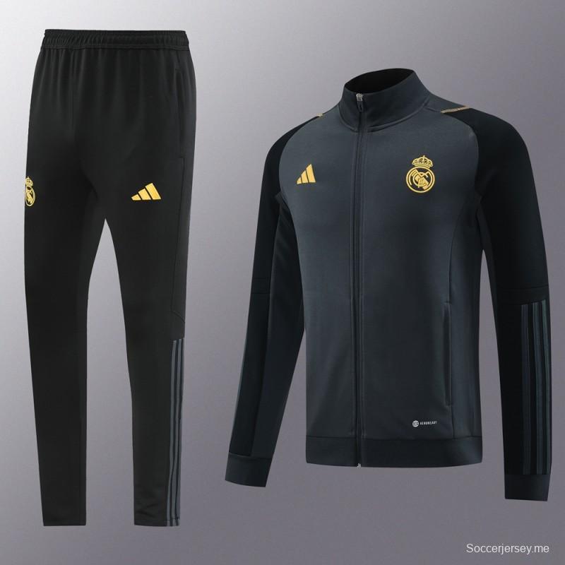 23/24 ريال مدريد جاكيت + بنطلون بسحاب كامل رمادي/أسود + بنطلون رمادي/أسود
