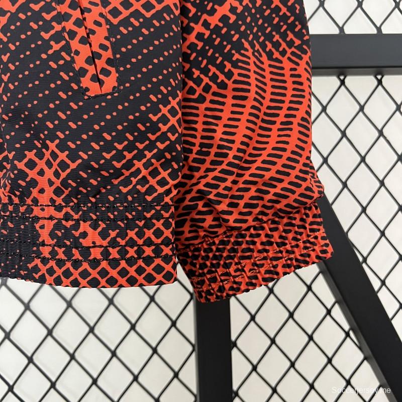 24/25 سترة ريـال مدريد صفراء/حمراء عاكسة قابلة للرياح