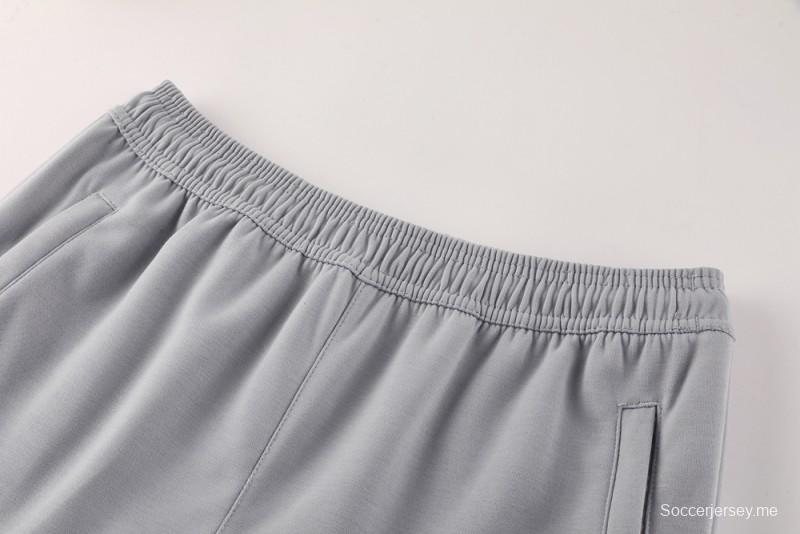 25/26 مانشستر يونايتد هويد جاكيت بسحاب كامل رمادي اللون هويد 25/26 مانشستر يونايتد + بنطلون طويل