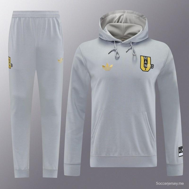 25/26 مانشستر يونايتد هويد جاكيت بسحاب كامل رمادي اللون هويد 25/26 مانشستر يونايتد + بنطلون طويل