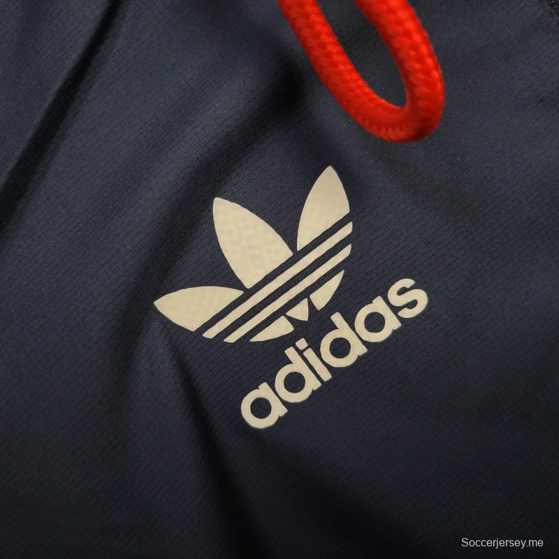 جاكيت أرسنال 25/26 سترة واقية من الرياح باللون الكحلي/الأحمر