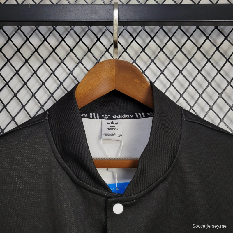 25/26 جاكيت مانشستر يونايتد أسود/سترة واقية من الرياح أبيض/أسود