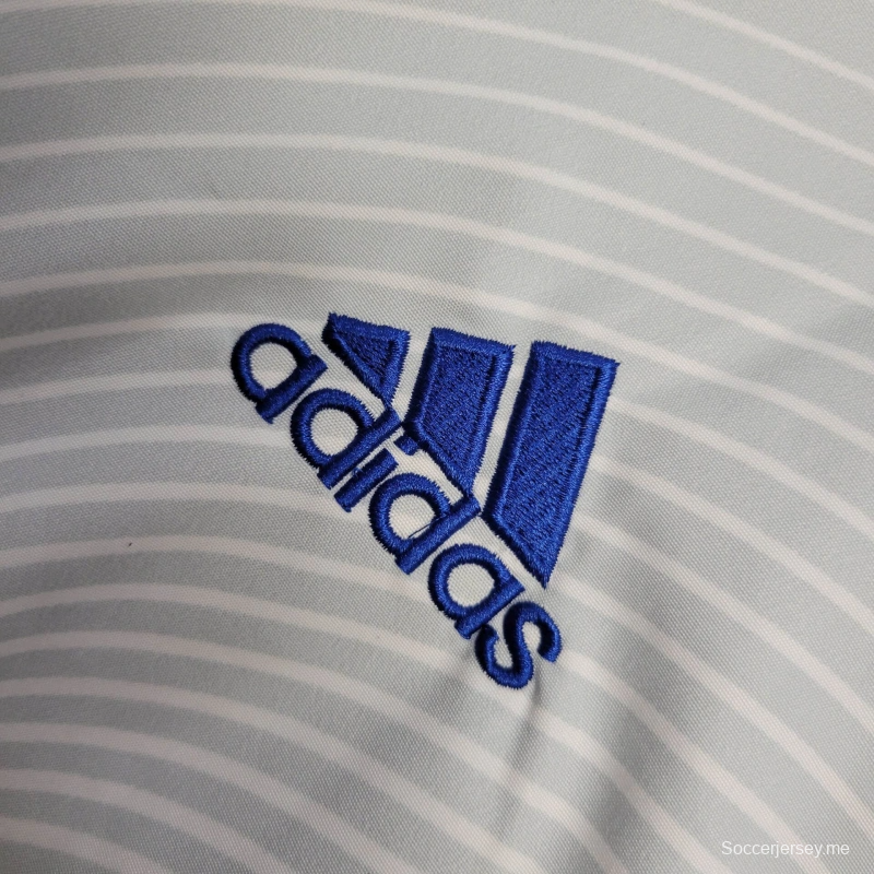 2025 جاكيت اليونان جاكيت أبيض/أزرق واقي من الرياح