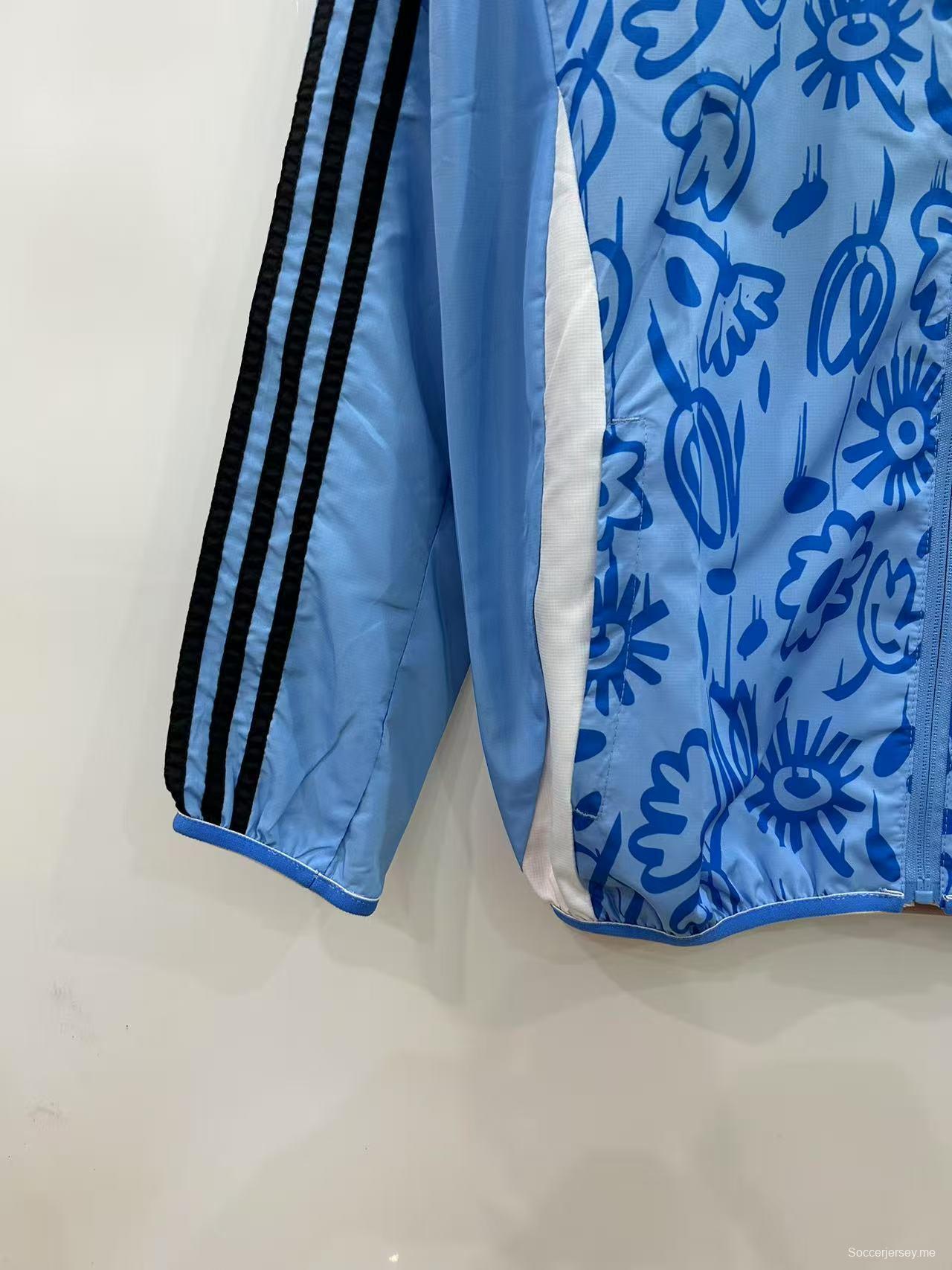 25/26 بوكا جونيورز بوكا جونيورز أزرق فاتح/بيج بنقشة زهور بسترة واقية من الرياح قابلة للانعكاس