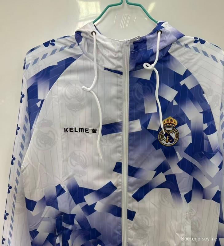 25/26 ريال مدريد سترة واقية من الريال أبيض بنقشة هندسية زرقاء