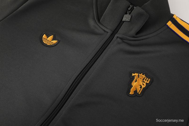 25/26 مانشستر يونايتد 08 رمادي غامق بنصف سحاب 25/26 مانشستر يونايتد + بنطال طويل S-2XL