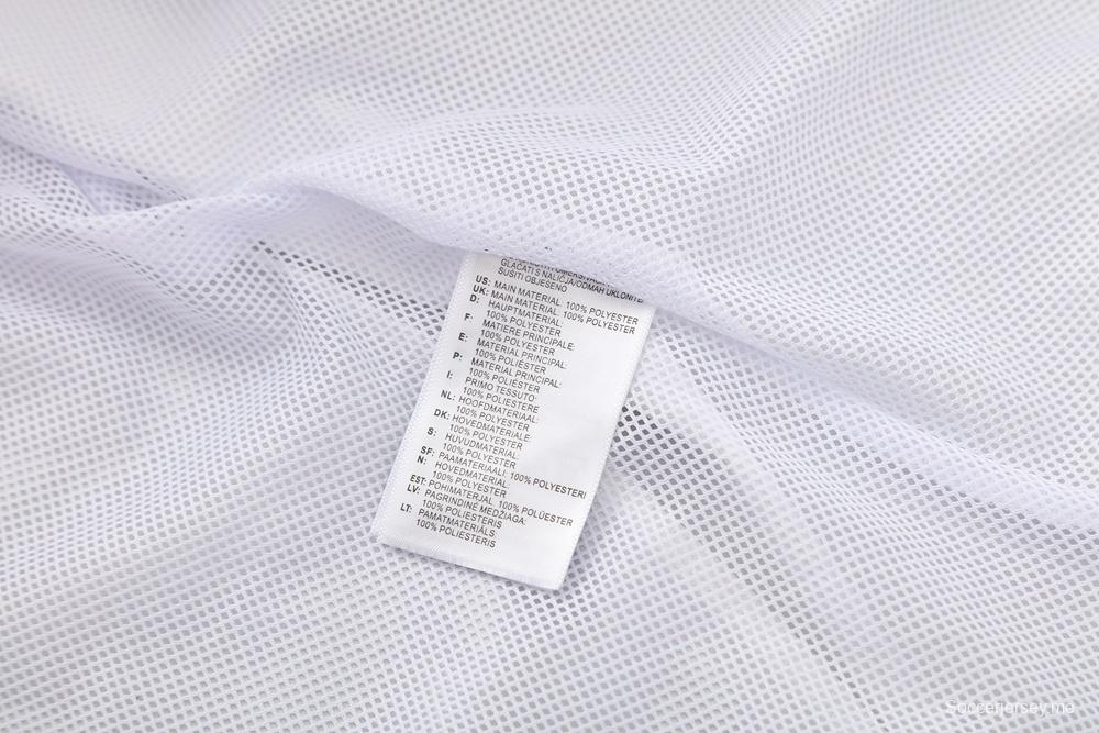 25/26 مانشستر يونايتد أبيض S-3XL مانشستر يونايتد سترة نصف سحاب + بنطلون طويل + بنطلون أبيض S-3XL