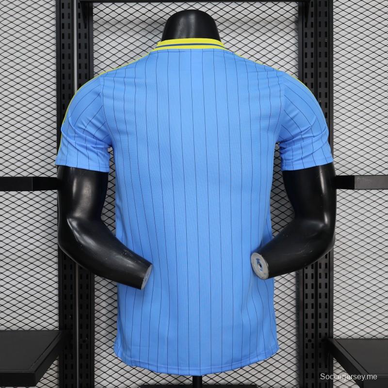 قميص اللاعب الإصدار 2026 بلون أزرق كولومبي مع أيقونات التراس