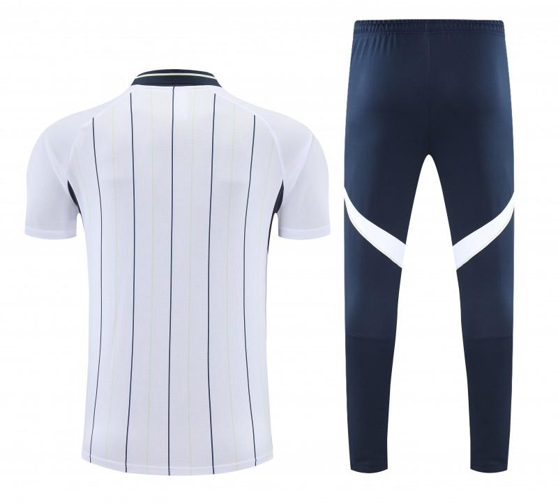 26/27   بدلة رياضية من ريال مدريد تتألف من قميص بولو أبيض مخطط + بنطال طويل