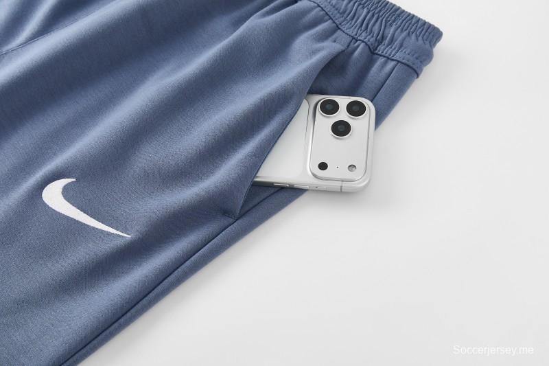 26/27  طقم رياضي من باريس سان جيرمان باللون الأزرق الفولاذي مع سترة بغطاء رأس وسحاب كامل + بنطال طويل