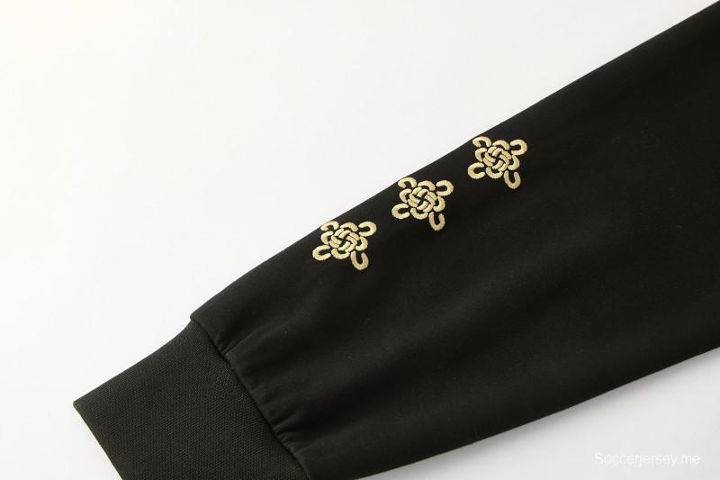 26/27 مانشستر يونايتد - بدلة رياضية سوداء بغطاء رأس وبنطال طويل