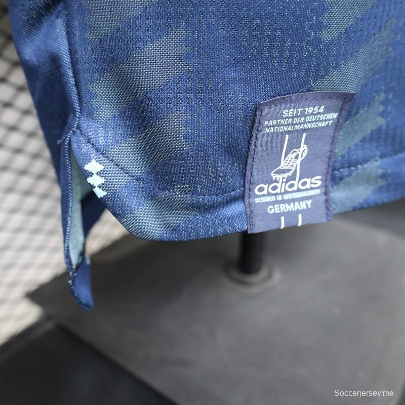قميص اللاعبين خارج الملعب، الإصدار 2026، ألمانيا، أزرق داكن بنمط متعرج