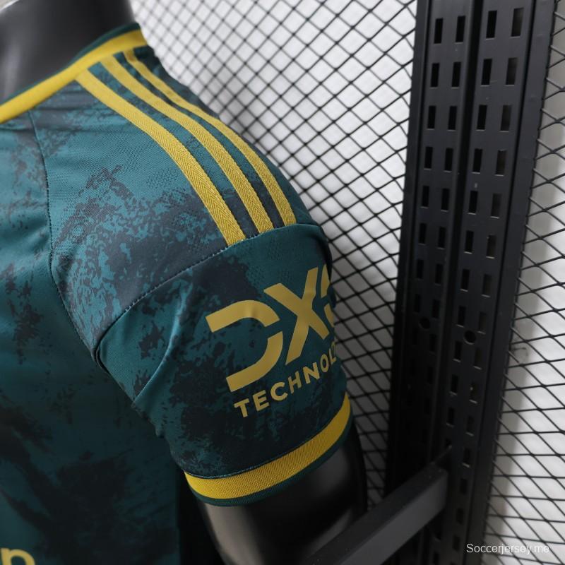 قميص اللاعب الإصدار 26/27 من مانشستر يونايتد باللونين الأزرق المخضر والذهبي - الإصدار الخاص الثالث